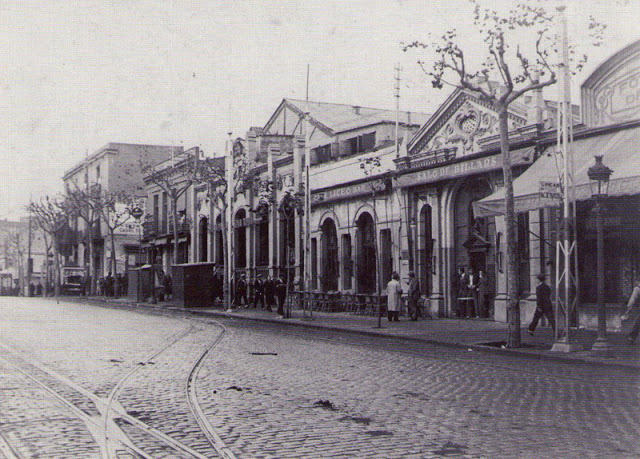 Carretera de Sants en 1933, con comercios y vías de tranvía